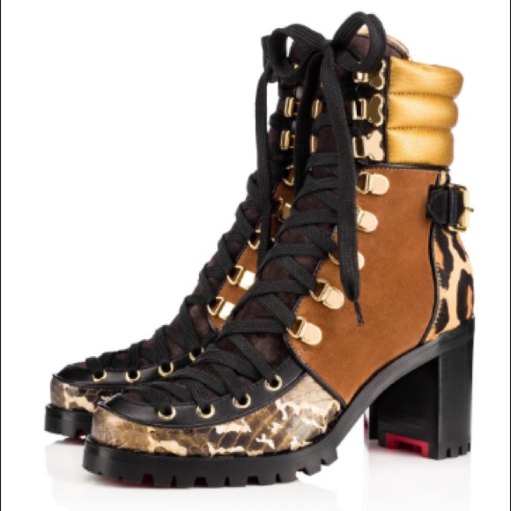 Christian Louboutin sz 36 Who runs 70 boot